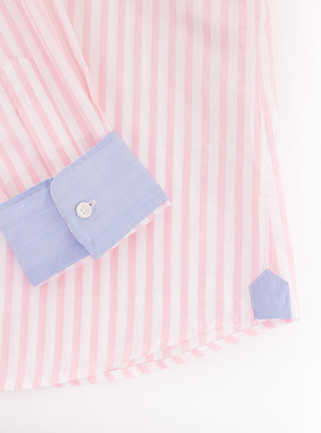 Flat lay of men's long sleeved shirt with pale pink and white stripe made with 100% cotton from Thomas Mason.